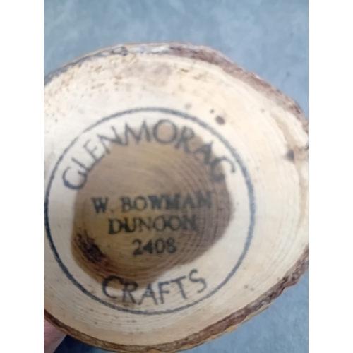 22 - A collection of eight turned wooden objects, primarily crafted in various mushroom forms, exhibiting... 