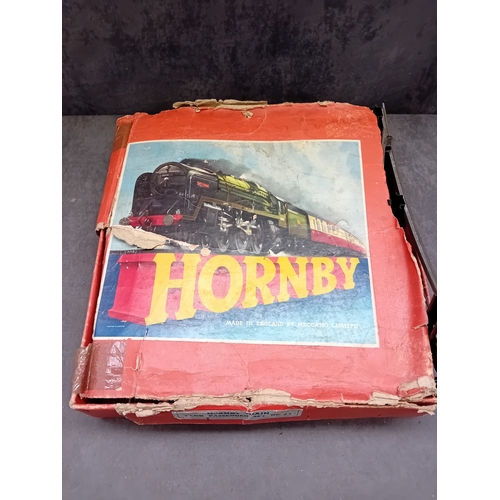 221 - A Hornby Gauge O clockwork Tank Passenger Set No. 41, manufactured by Meccano Ltd. in Liverpool, Eng... 