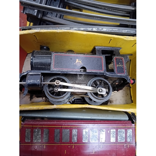 221 - A Hornby Gauge O clockwork Tank Passenger Set No. 41, manufactured by Meccano Ltd. in Liverpool, Eng... 