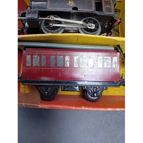 221 - A Hornby Gauge O clockwork Tank Passenger Set No. 41, manufactured by Meccano Ltd. in Liverpool, Eng... 