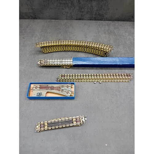 227 - A collection of 21 vintage Hornby Dublo 3 Rail model railway track components. This lot comprises va... 
