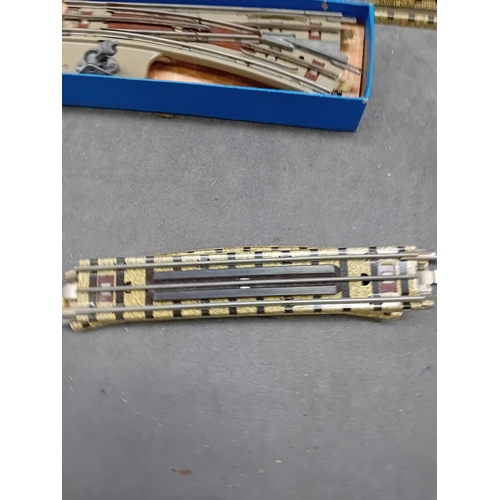 227 - A collection of 21 vintage Hornby Dublo 3 Rail model railway track components. This lot comprises va... 