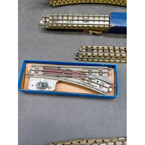 227 - A collection of 21 vintage Hornby Dublo 3 Rail model railway track components. This lot comprises va... 