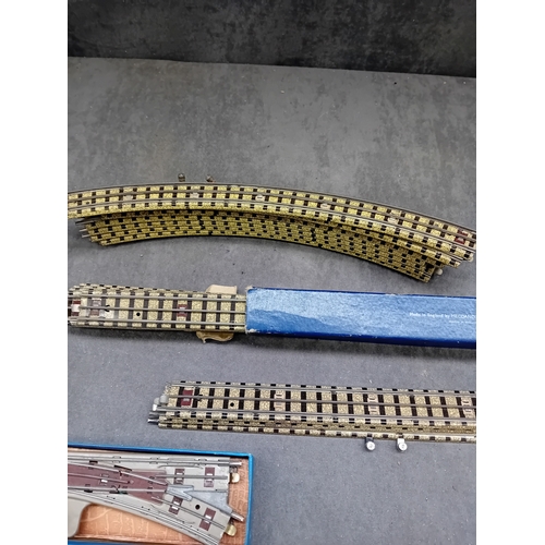 227 - A collection of 21 vintage Hornby Dublo 3 Rail model railway track components. This lot comprises va... 