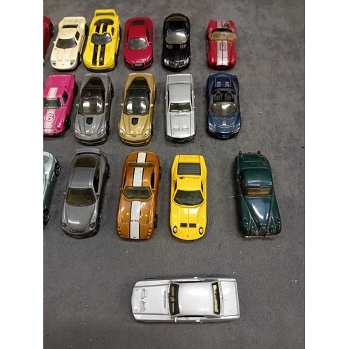 251 - A collection of die-cast toy cars, including models by Matchbox. The lot comprises approximately 25-... 