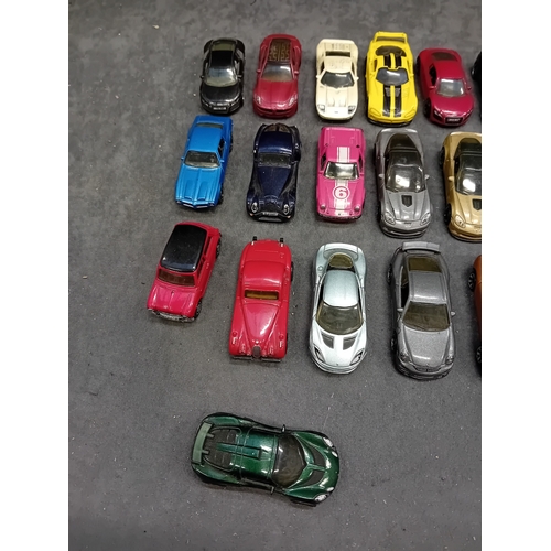 251 - A collection of die-cast toy cars, including models by Matchbox. The lot comprises approximately 25-... 