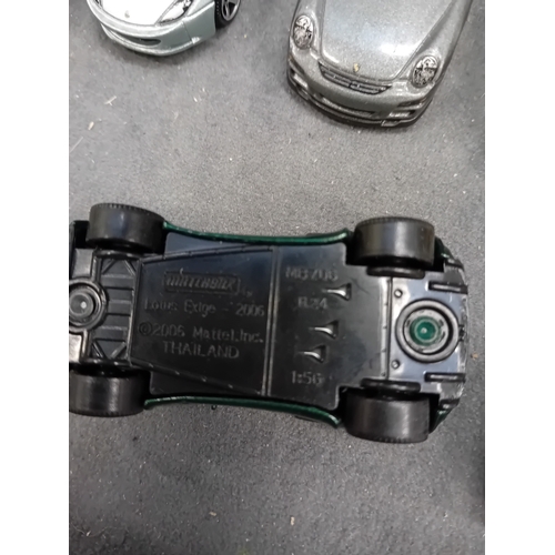 251 - A collection of die-cast toy cars, including models by Matchbox. The lot comprises approximately 25-... 