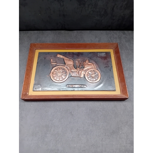 261 - This framed metal relief art piece depicts a vintage Fiat 1901 automobile. It is crafted from copper... 