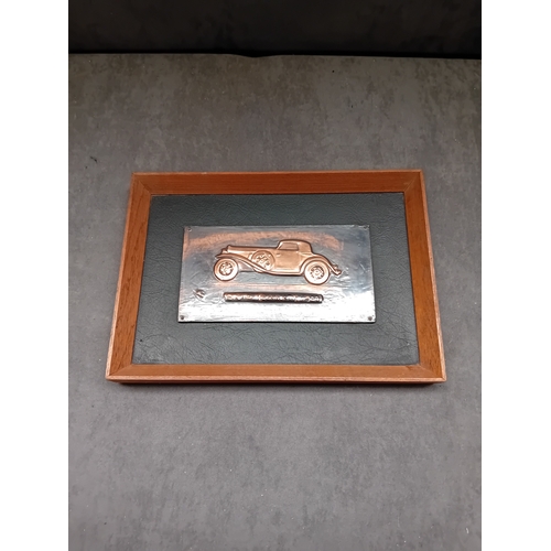 267 - A hand-wrought Metal relief plaque depicting a Stutz Blackhawk automobile, created by Richard C. Han... 