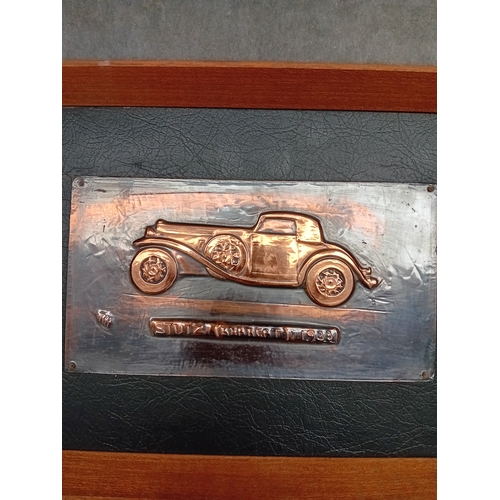 267 - A hand-wrought Metal relief plaque depicting a Stutz Blackhawk automobile, created by Richard C. Han... 