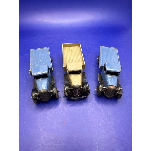 312 - 3 x Dinky flat Bed Trucks as pictured. Unboxed.