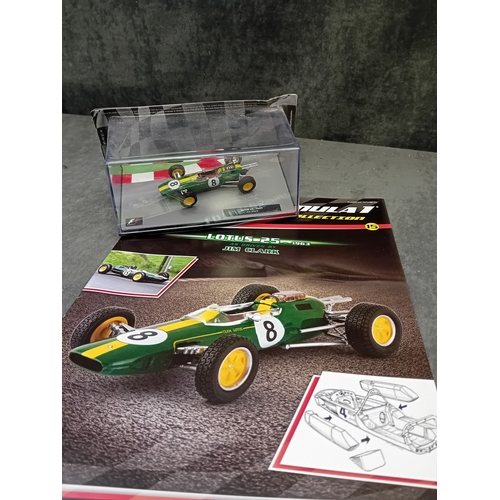 328 - A group of five die-cast Formula 1 model cars and accompanying magazines from the Panini Formula 1 T... 