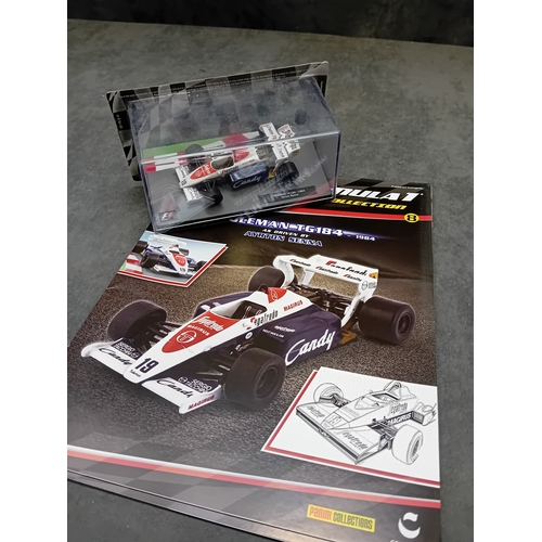 A group of five die-cast Formula 1 miniature car models from the Panini ...