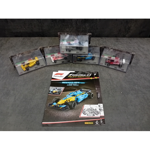 340 - A collection of 5 die-cast model Formula 1 racing cars from the 