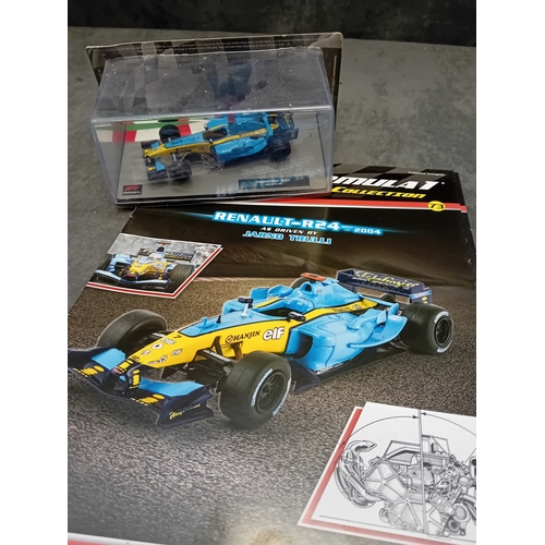 340 - A collection of 5 die-cast model Formula 1 racing cars from the 