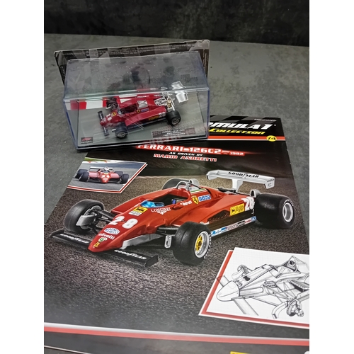 340 - A collection of 5 die-cast model Formula 1 racing cars from the 