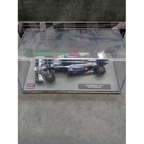 348 - This 5-car set comprises highly detailed Burago 1:43 scale die-cast metal and plastic replicas of Fo... 