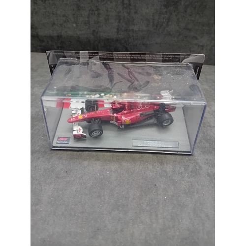 349 - A collection of five die-cast model cars from the 'Formula 1 The Car Collection' series, likely part... 