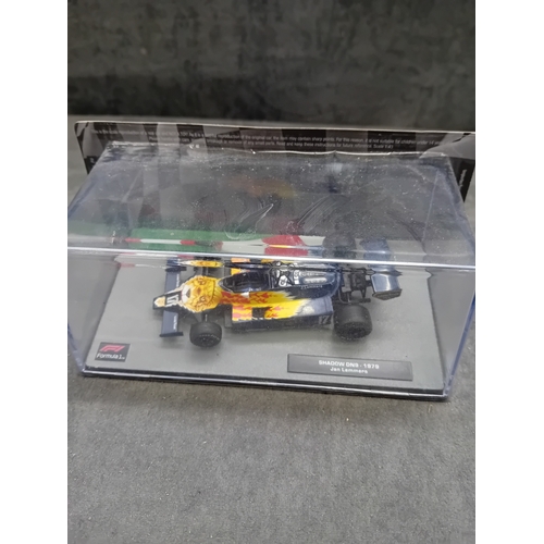 349 - A collection of five die-cast model cars from the 'Formula 1 The Car Collection' series, likely part... 