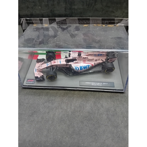 349 - A collection of five die-cast model cars from the 'Formula 1 The Car Collection' series, likely part... 