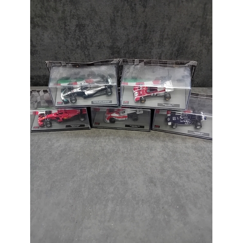 351 - A group of five Panini - The Car Collection 1/43 Scale Formula One F1 die-cast model cars, comprisin... 