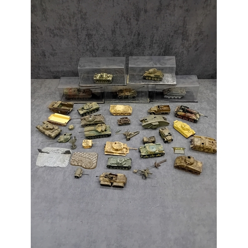 363 - A substantial collection of approximately 40-50 miniature military vehicles, predominantly tanks and... 