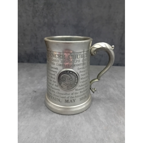 38 - A vintage commemorative Winston Churchill English pewter tankard. The tankard features an ornate han... 