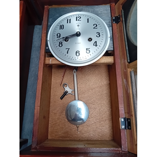 465 - A Matching pair of wall clock - Polaris Branding with oriental theme. one has minor glass damage as ... 