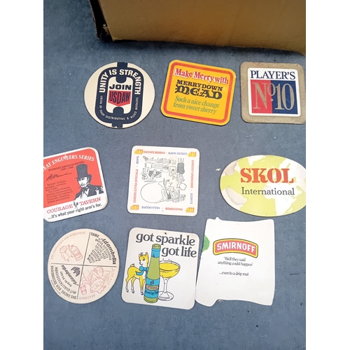 496 - A collection of vintage paperboard beverage coasters or beer mats, dating from the mid-to-late 20th ... 