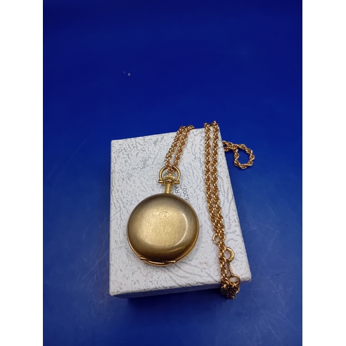 51 - A Bentima STAR hunter-case pocket watch crafted from gold-toned metal, accompanied by a matching cab... 