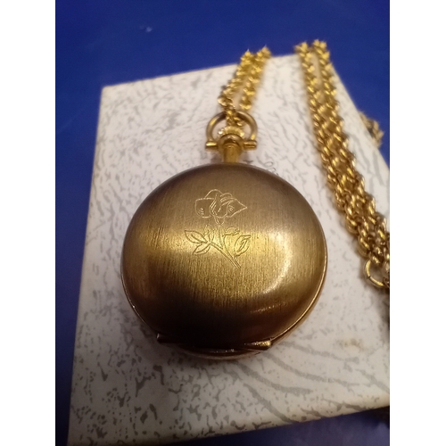 51 - A Bentima STAR hunter-case pocket watch crafted from gold-toned metal, accompanied by a matching cab... 