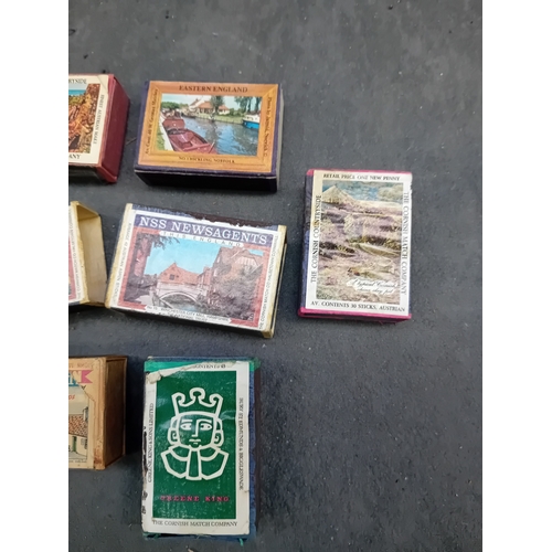 510 - A group of ten vintage cardboard matchboxes, each featuring pictorial designs primarily depicting Br... 