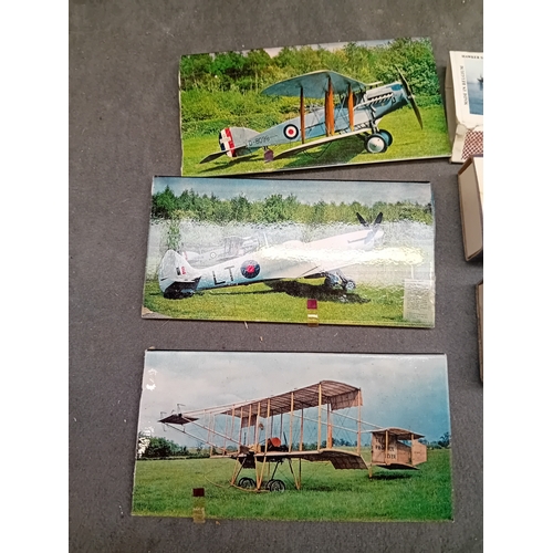 512 - This lot comprises a collection of vintage matchbooks and three larger associated aviation-themed ca... 
