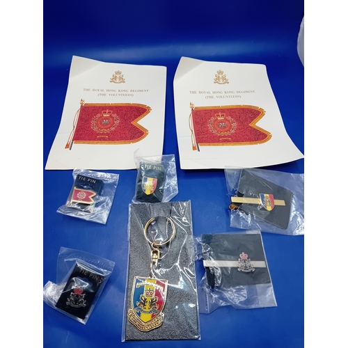 52 - A collection of eight commemorative items related to The Royal Hong Kong Regiment (The Volunteers), ... 