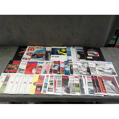 548 - This lot comprises 49 individual issues of automotive enthusiast magazines and club newsletters. The... 