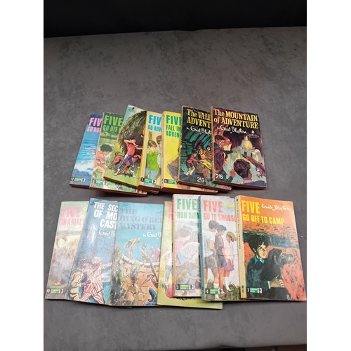 560 - A collection of fourteen mass-market paperback books authored by Enid Blyton, published by Armada Bo... 
