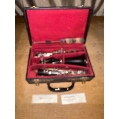 57 - Vito Reso-Tone Clarinet. The instrument components include the upper joint, lower joint, bell, barre... 