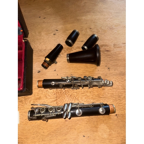 57 - Vito Reso-Tone Clarinet. The instrument components include the upper joint, lower joint, bell, barre... 