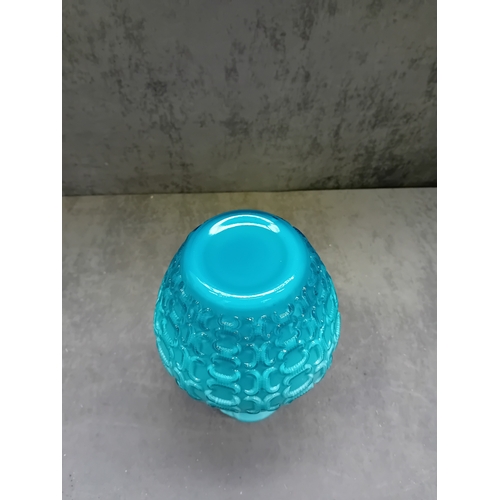 575 - A 20th Century Italian blue glass jug. This opaline glass vessel presents in a vibrant, opaque turqu... 