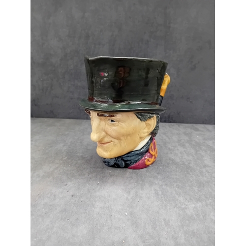 585 - A Royal Doulton 'John Peel' character jug, crafted from polychrome glazed ceramic. The jug depicts a... 