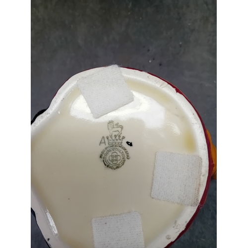 585 - A Royal Doulton 'John Peel' character jug, crafted from polychrome glazed ceramic. The jug depicts a... 