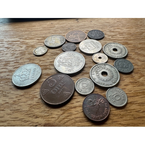 626 - A collection of approximately 25 assorted Norwegian coins, as indicated by the prominent 