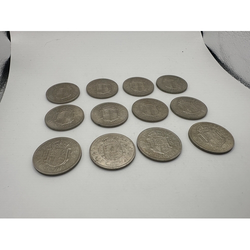631 - A collection of twelve British Half Crown coins, comprising examples predominantly from the reign of... 