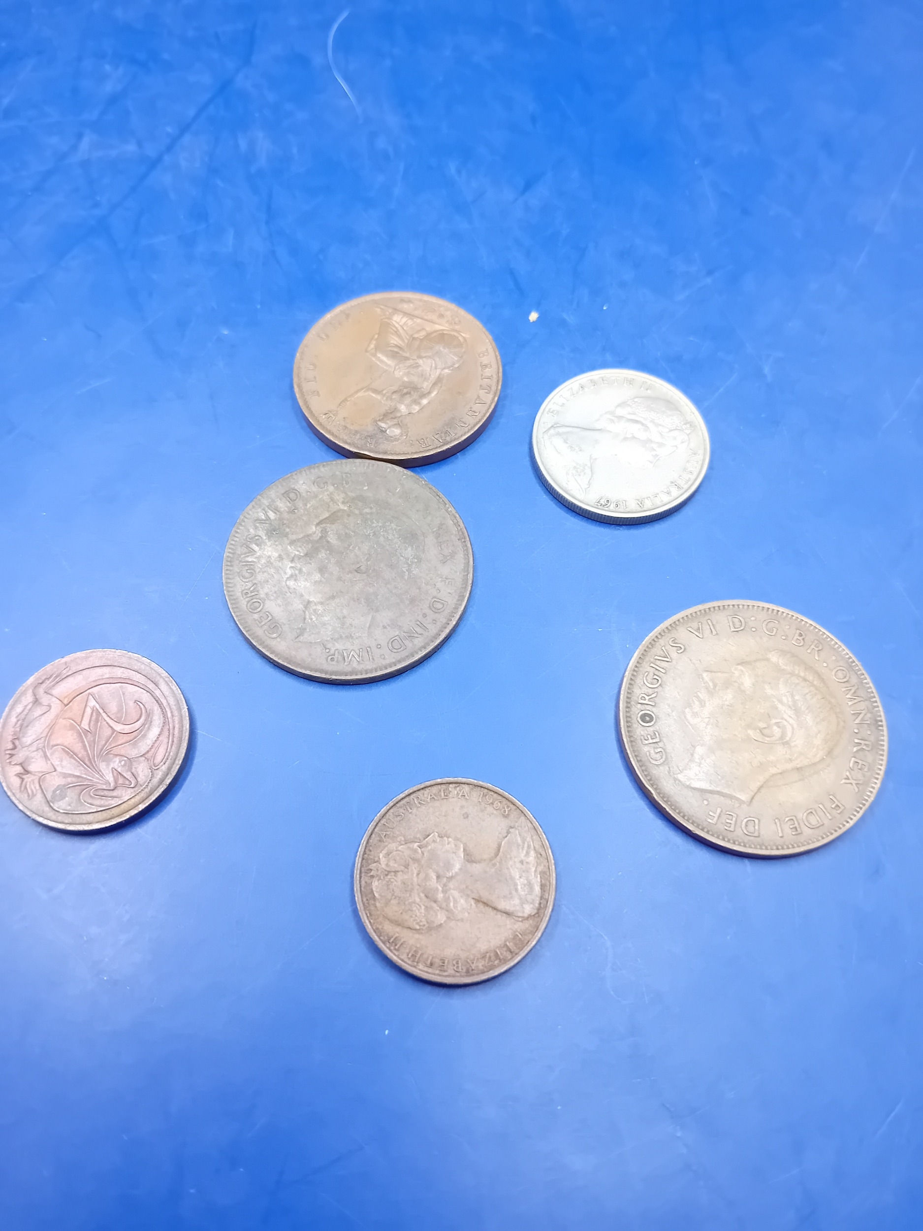 A collection of six (6) heavily circulated base metal coins from the ...