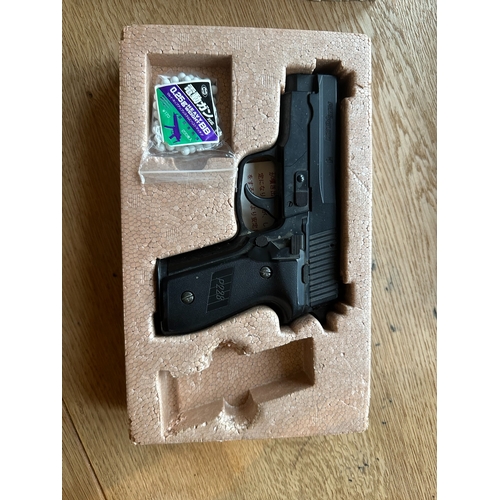 92 - A vintage Marui (MARUI) SCORPIZE P228 Air Sport Gun set. This is a 1/1 scale, spring-cocking replica... 