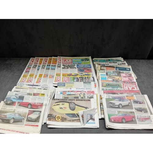 28 - This lot comprises 56 English-language print media items, specifically automotive newspapers and mag... 