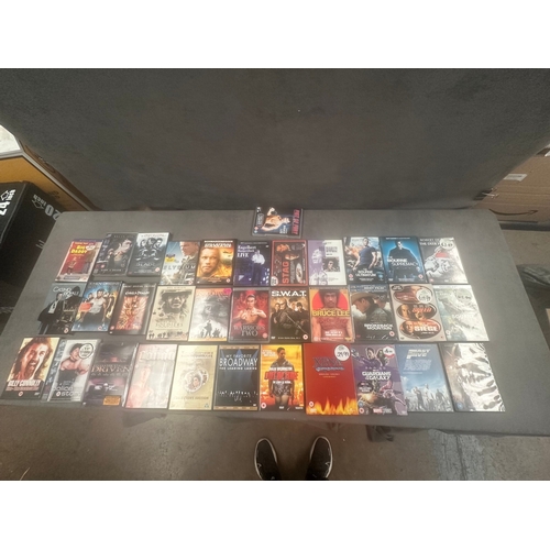 5 - A collection of approximately 75 DVD titles from Box 5, including an assortment of movies and televi... 