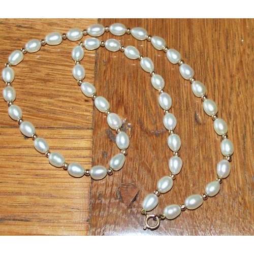 49 - A teardrop set  pearl  8 choker with a 9k stamped clasp tested