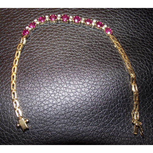 64 - Superb outstanding quality 18ct gold fully hallmarked  bracelet  consisting of  9  oval shape rubies... 