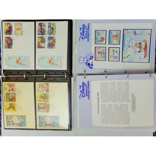 28 - 2 Albums of Disney world postage stamps & 1st day covers